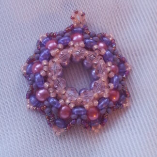 Kela medal pendant crystals pearls pink purple